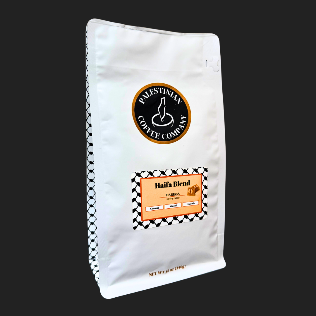 Whole bean Haifa Blend Harissa coffee by The Palestinian Coffee Company, showcasing the rich, aromatic coffee beans in a 12 oz bag.