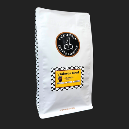 Whole bean Tabariya Blend Cold Brew coffee by The Palestinian Coffee Company, showcasing dark roasted beans in a 12 oz package.