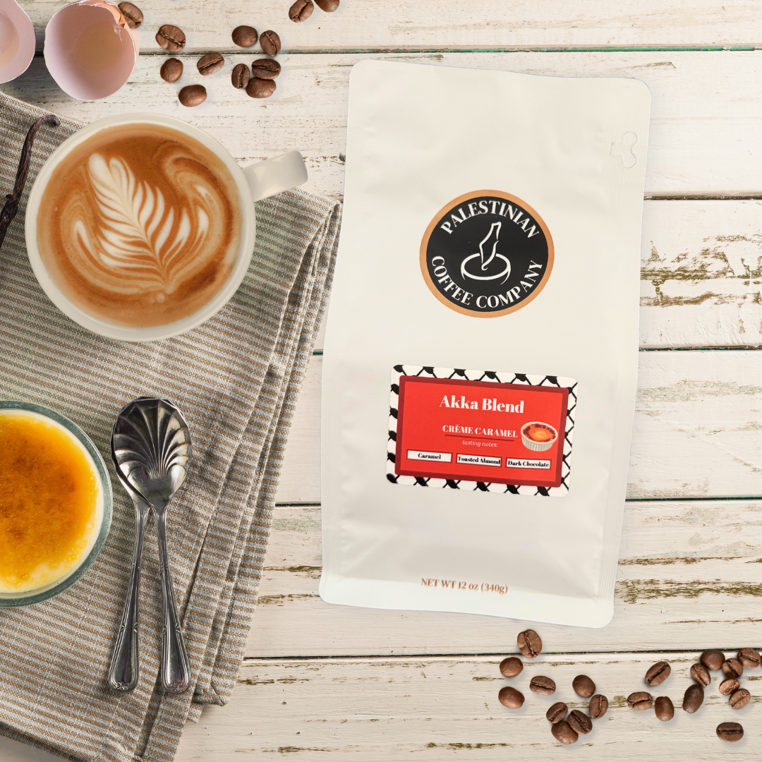 Ground Akka Blend Crème Caramel coffee from The Palestinian Coffee Company, showing the coffee grounds in a clear container.