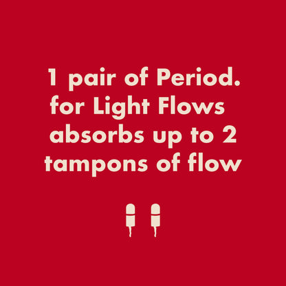 Black microfiber The Thong Period pad by The Period Company designed for light flows, shown on a plain background.
