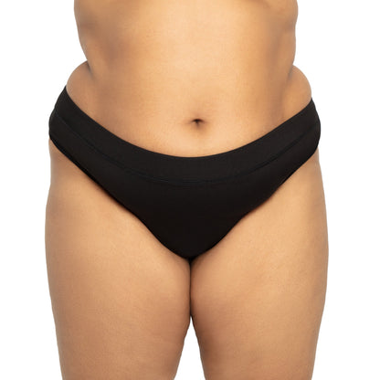 Black microfiber The Thong Period panty by The Period Company designed for light flows, shown from a side view.