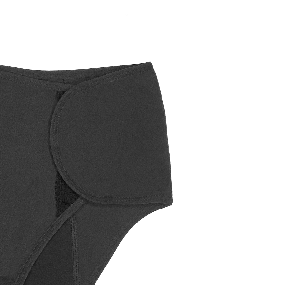 Black XS The Adaptive Period microfiber pad for heavy flows by The Period Company, shown on a white background.