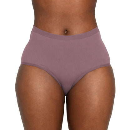 Black high-waisted microfiber period underwear from The Period Company for medium flows, shown flat on a surface.