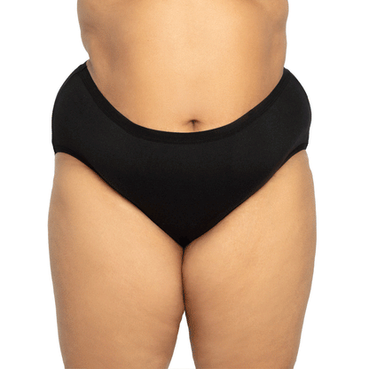 Black high-waisted microfiber period underwear by The Period Company designed for medium flows, shown laid flat.