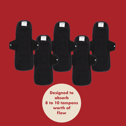 Set of five reusable feminine pads from The Period Company in black, designed for heavy flow protection.