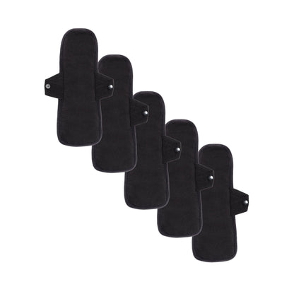 Set of five reusable pantyliners for medium flows by The Period Company, showing black, soft, eco-friendly feminine pads.