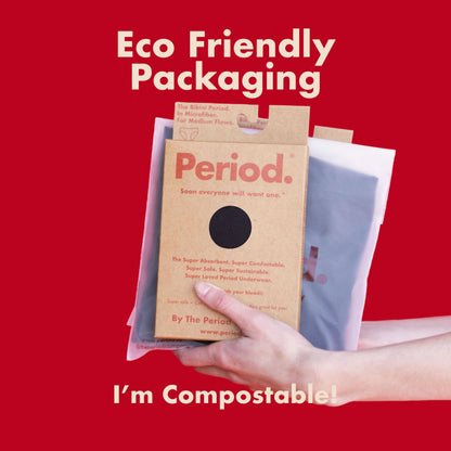 Red The Period Company pouch with logo, compact and stylish storage for menstrual products or everyday essentials.