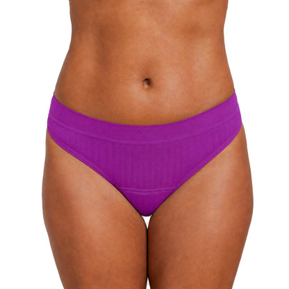 Light flow thong pad from The Period Company in SportyStretch™ fabric, shown on a neutral background.