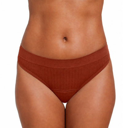 On-body view of The Thong Period with SportyStretch™ fabric for light flows, showcasing its sleek design and comfortable fit.