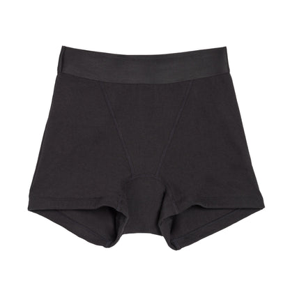 Black boxer underwear by The Period Company, made of organic cotton for heavy flows, shown on a model.