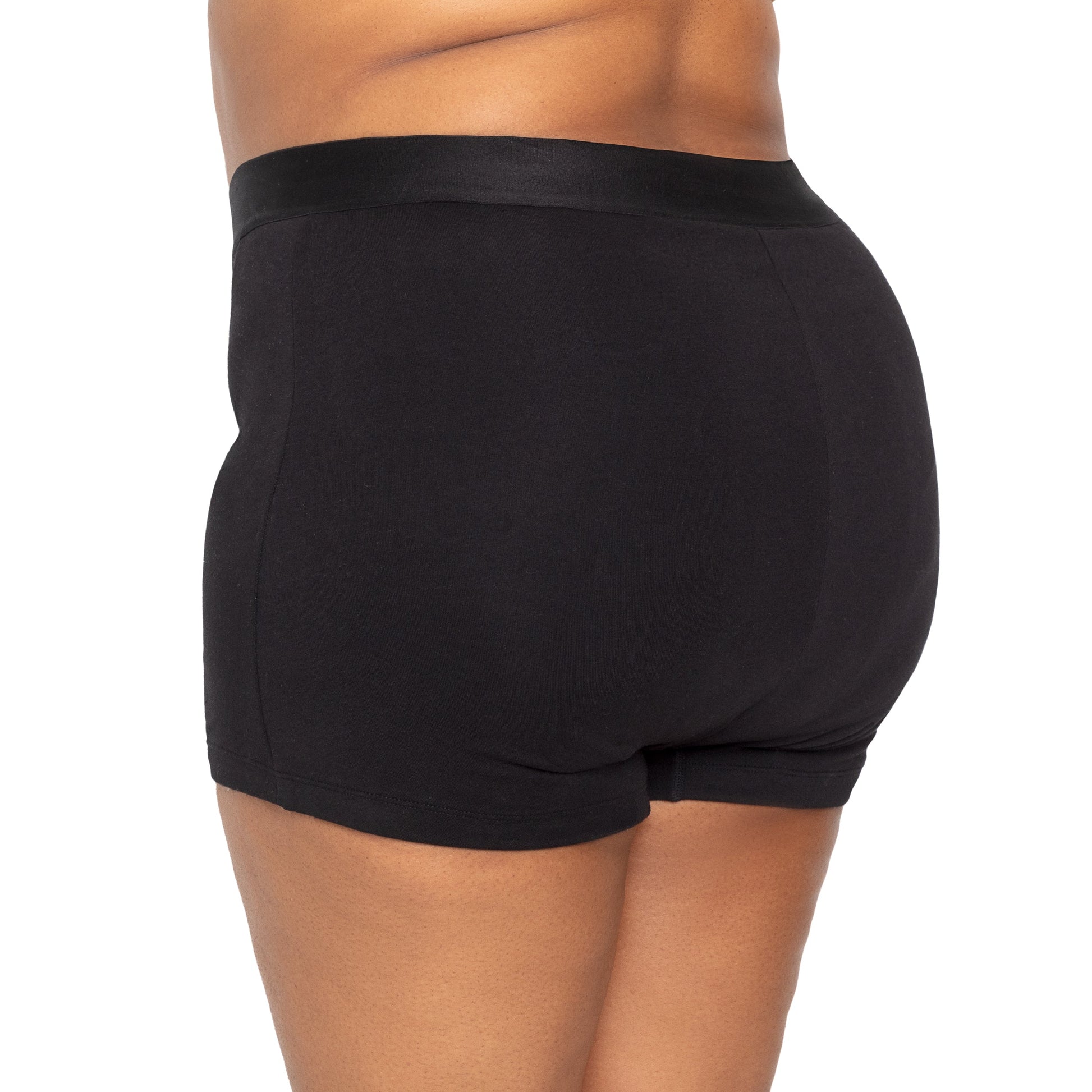 Black organic cotton boxer underwear from The Period Company designed for heavy flows, shown on a white background.