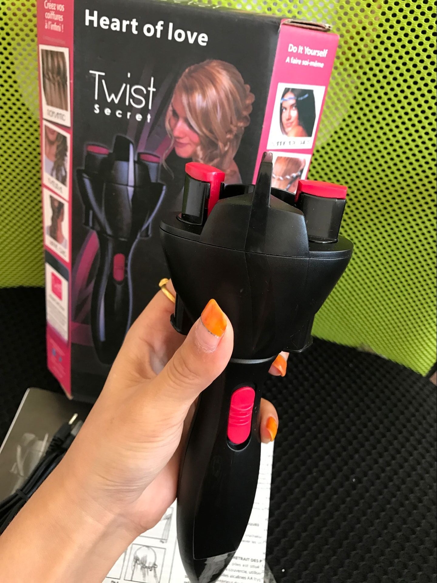 USB electric automatic hair braider and twister tool by TrendDora, showing the compact device with rotating hair braiding mechanism.