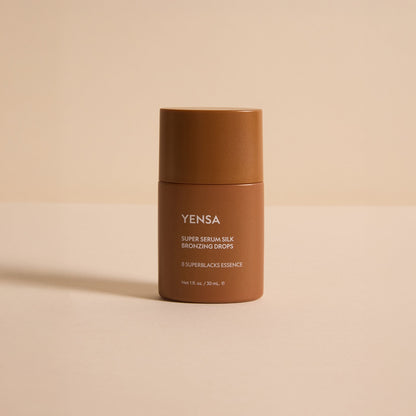 YENSA Super Serum Silk Bronzing Drops in a dropper bottle, highlighting their silky bronze liquid formula for a natural glow.
