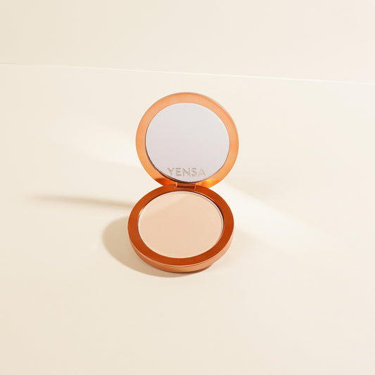 YENSA Super Serum Silk Matte Powder Foundation in Fair 1 with pressed powder texture and smooth, matte finish.