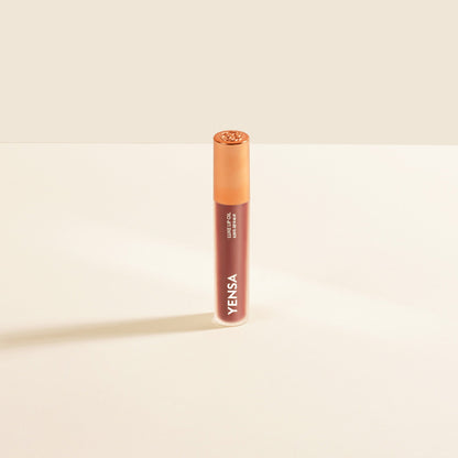 YENSA Luxe Lip Nourishing Oil with Hyaluronic and Vitamin E, featuring a glossy lip oil in a sleek bottle with a red tint.