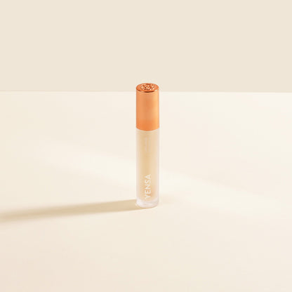 YENSA Luxe Lip Nourishing Oil with Hyaluronic and Vitamin E, displaying a sleek lip oil bottle with a glossy finish.