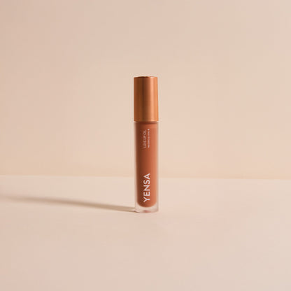 YENSA Luxe Lip Nourishing Oil with Hyaluronic and Vitamin E, displaying a sleek lip oil bottle with a clear, glossy finish.