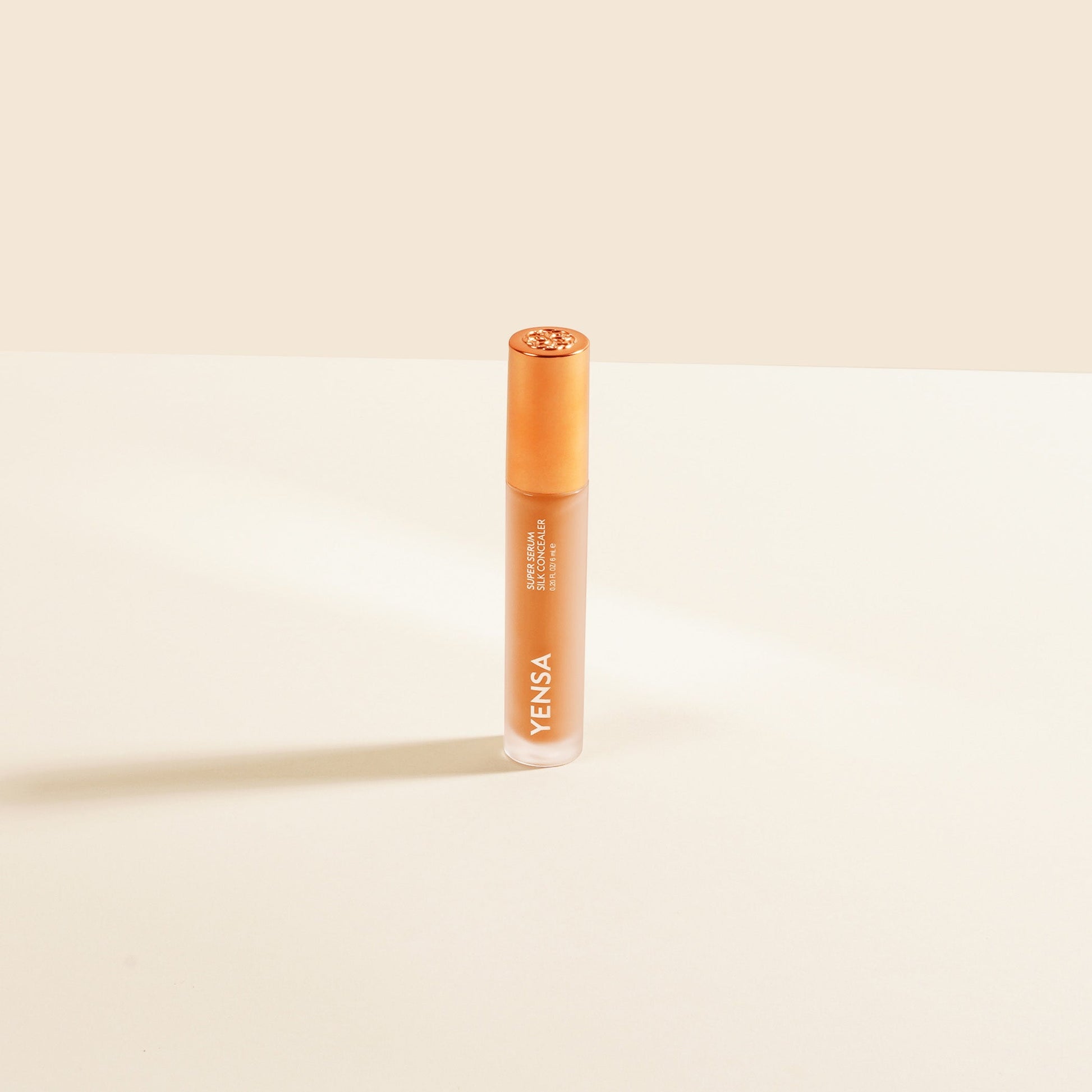 YENSA Super Serum Silk Concealer makeup product with fair shade, featuring smooth, creamy texture and sleek packaging.