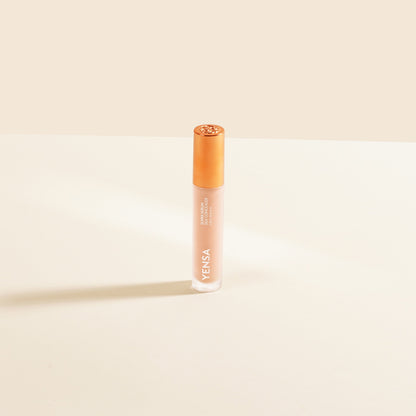 YENSA Super Serum Silk Concealer makeup product in fair shade, featuring a sleek tube with applicator for flawless coverage.