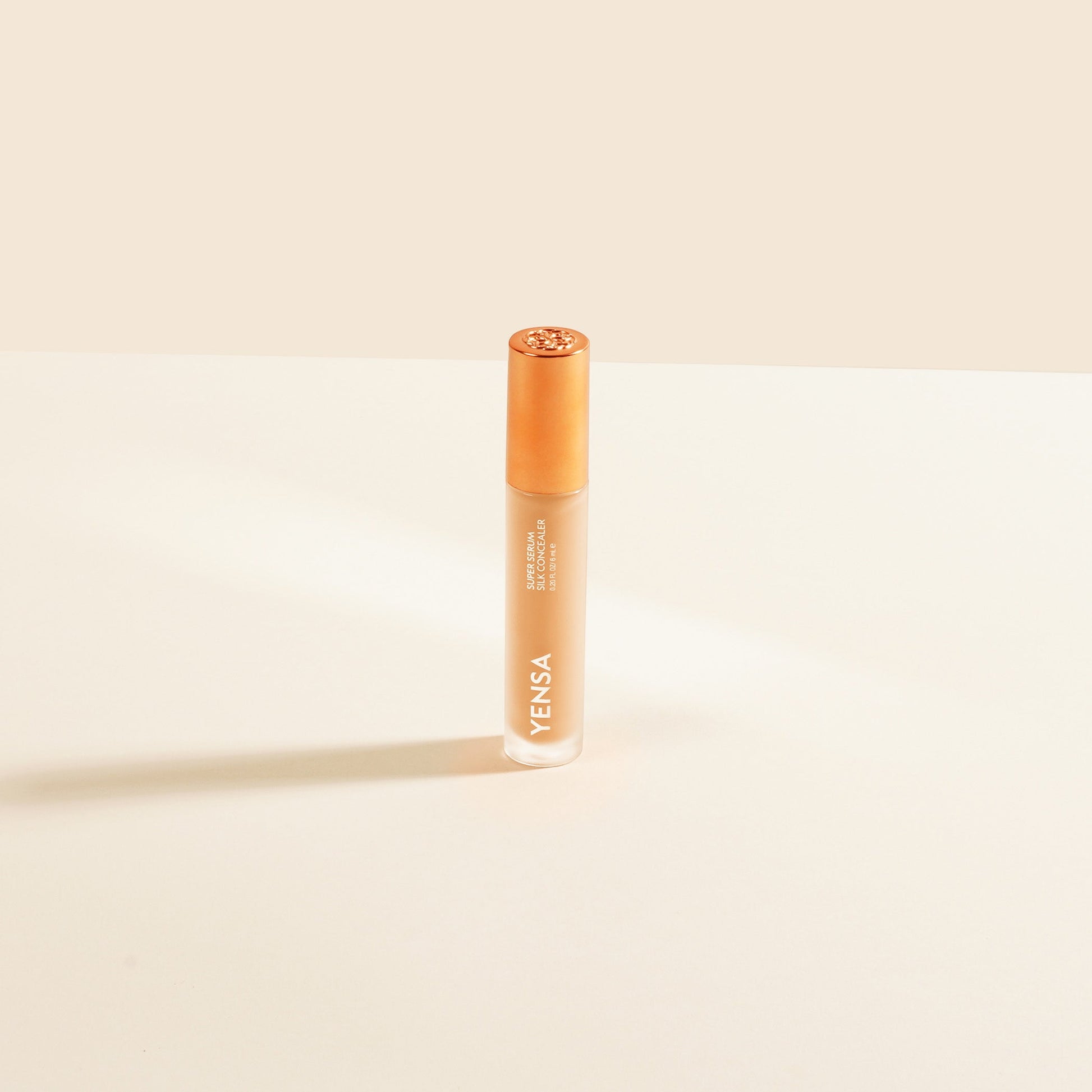 YENSA Super Serum Silk Concealer makeup product in fair shade, showing smooth, creamy texture and sleek packaging.
