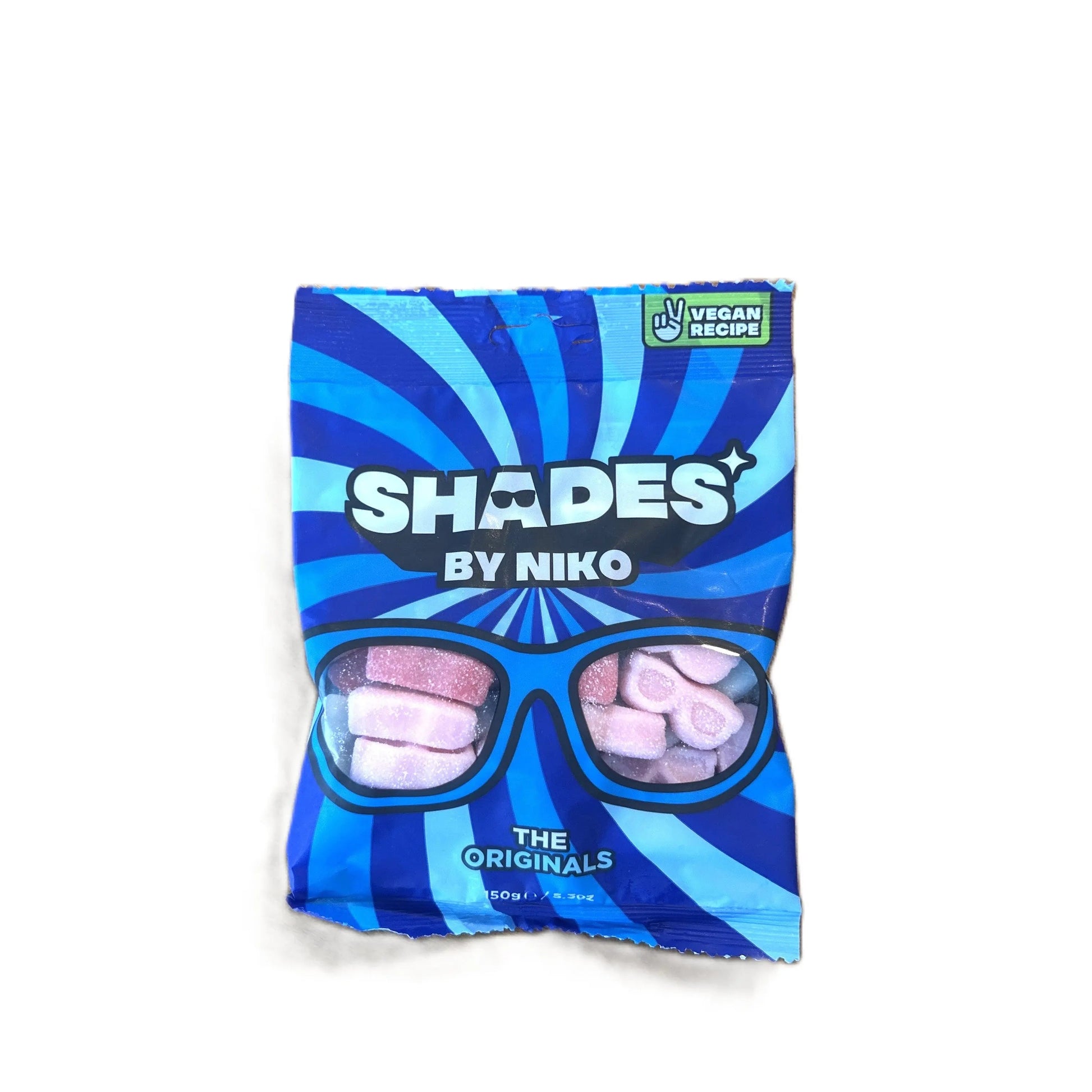 Assorted mixed candies in a clear bag from Shades by Niko The Originals, 150g Yum At Hart premium candy in UK packaging.