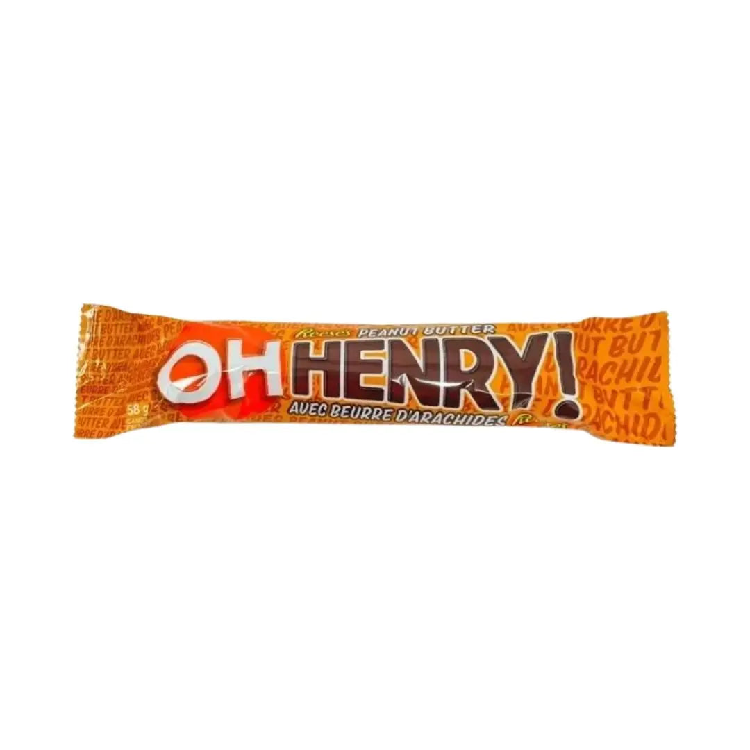 Yum At Hart Oh Henry! chocolate bar with Reese’s peanut butter, peanuts, and caramel, 58g, showing the chocolate bar with peanut filling.