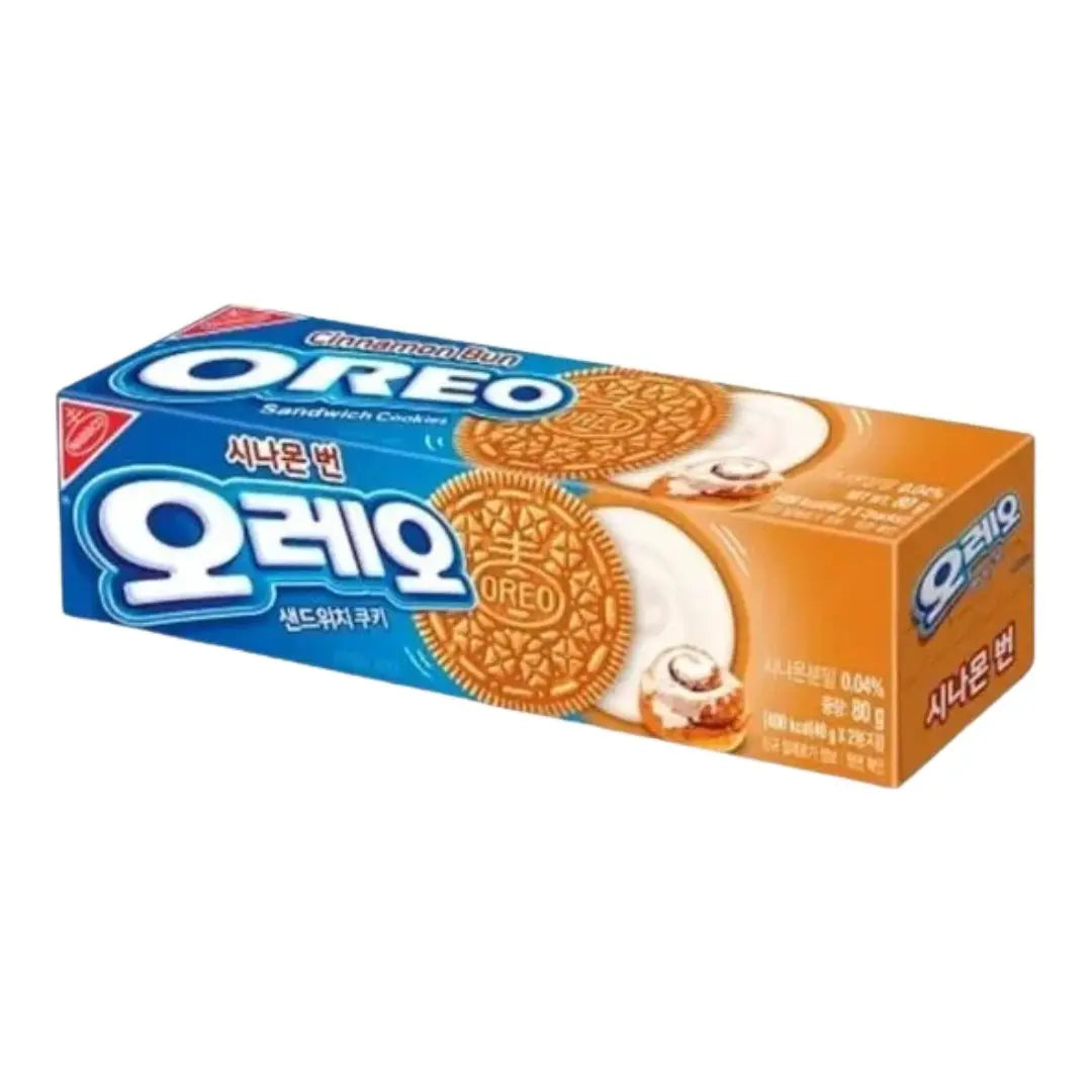 Yum At Hart Oreo Cinnamon Bun cookies, cinnamon-flavored sandwich cookies in 80g package, displayed in a bright, inviting setting.